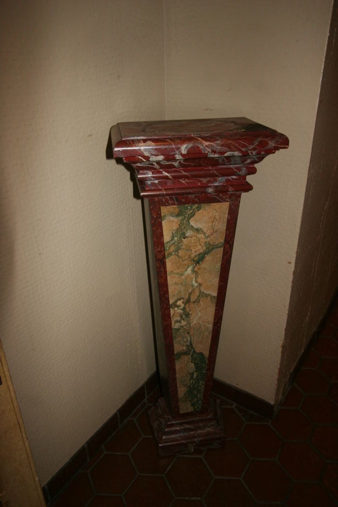 Pair of venetian faux marble pedestals.