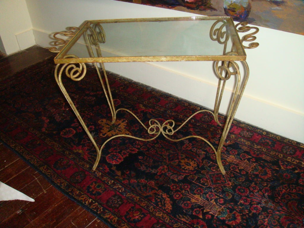 Cocktail iron coffee table. Wonderful patina and great iron work details.