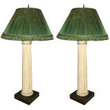 Pair of fluted wood Column lamps  on a bronze plynth