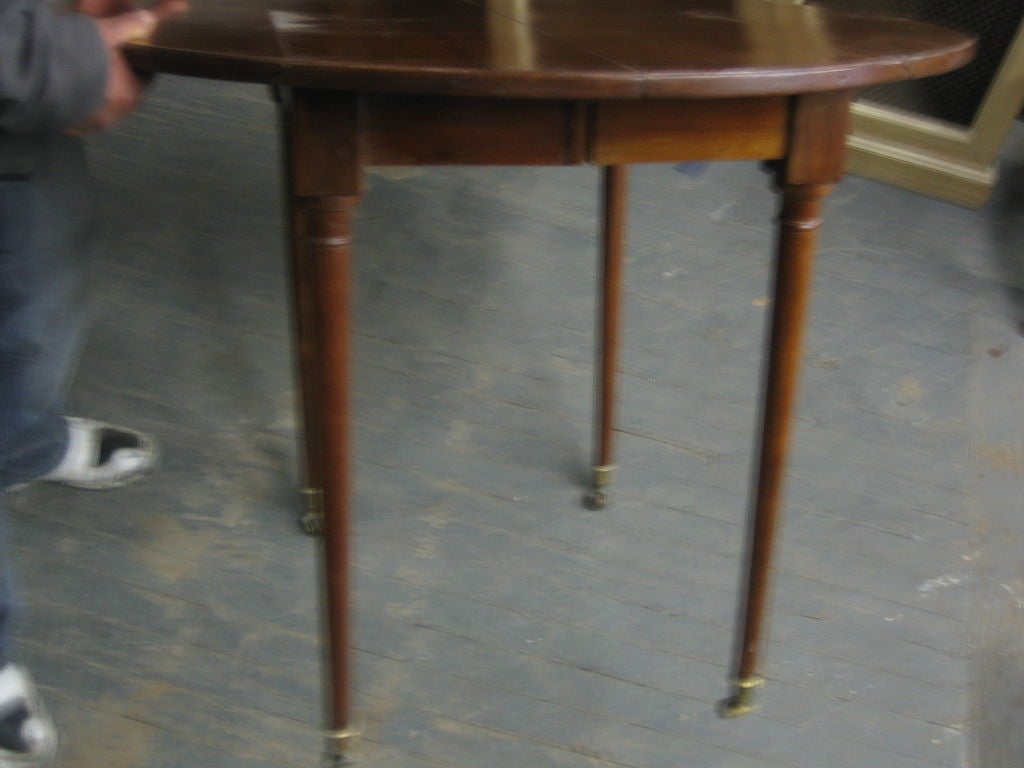 England,

circa 1810.

An English pembroke table in mahogany dating from the Regency period.



The table mounted on four tapering round legs with inlay, each ending in brass castors.

Contact us for more info.