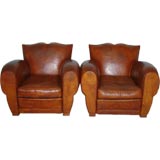 Pair of Leather Curved Arm Mustache Club Chairs