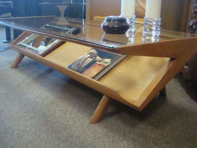 Mid Century Danish Modern Coffee Table with Glass Top. <br />
Piece has Slanted Book/Magazine Rack for storage.<br />
Original Brown Saltman Piece from California.