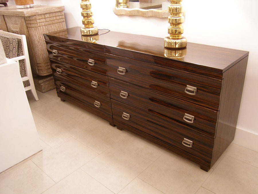 Pair of French Wavy Front Macassar Ebony Dressers