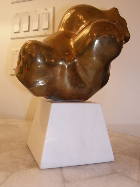 Chaim gross signed and casting 1/6 bronze tumbler sculpture on stone base.

Throughout his long career, Chaim Gross (1904-1991) relentlessly forged new formal constructions within his framework of figurative sculpture. Reflecting upon how he