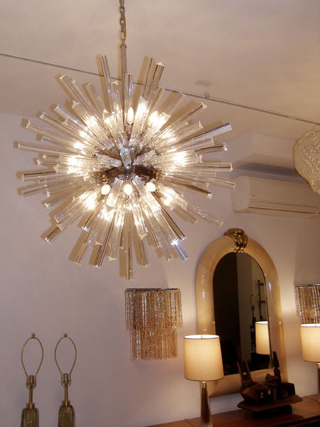 Crystal and nickel snowflake chandelier with polished nickel hardware.