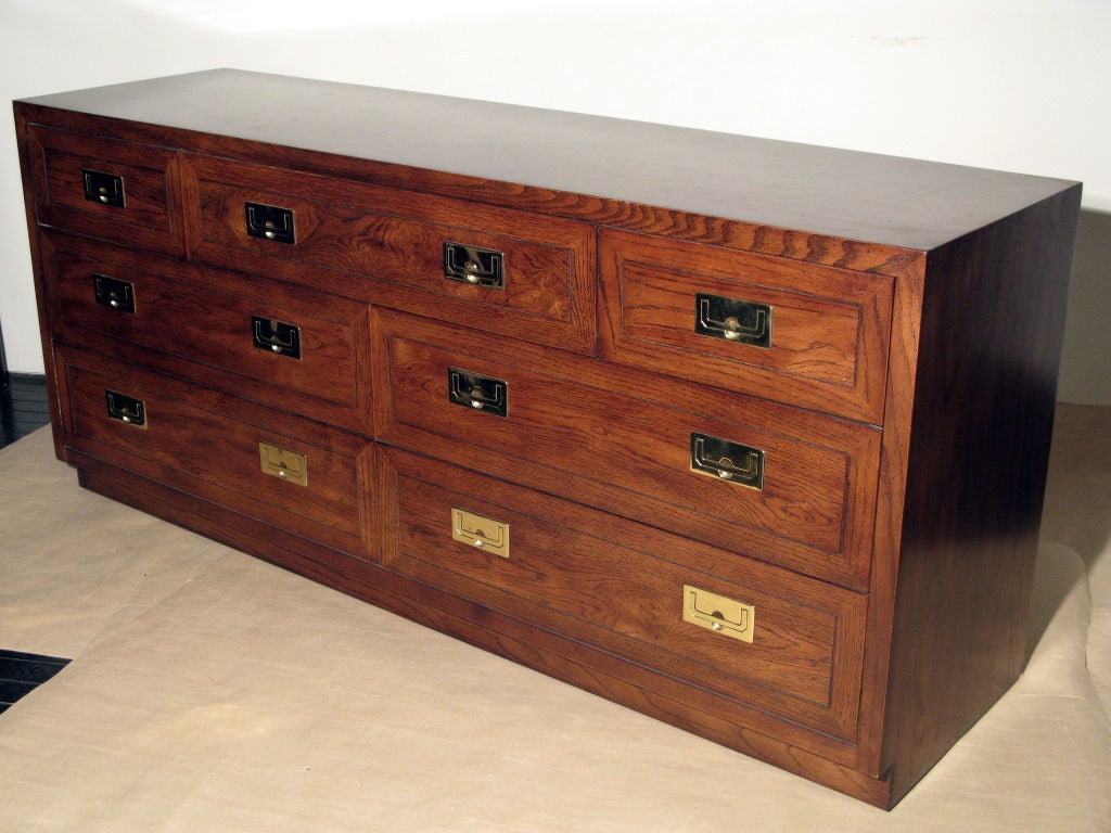 Campaign Style chest of drawers in oak with inset brass pulls by <br />
Henredon, American 1970's