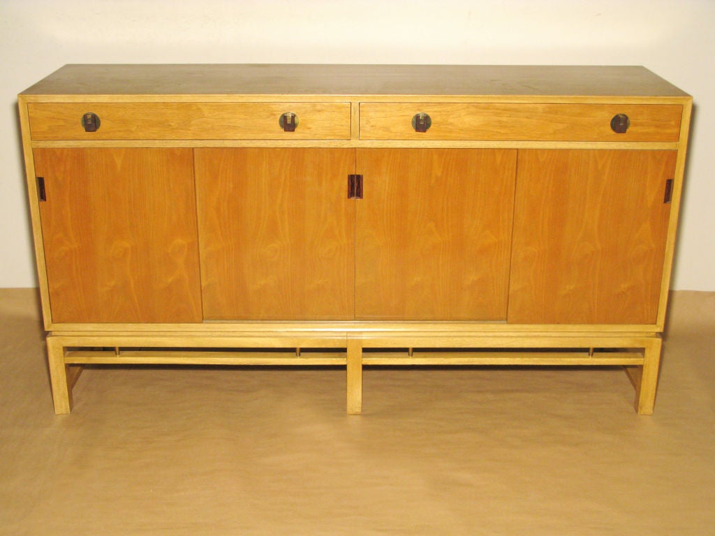 4 Door commode , case in mahogany with walnut doors and Brazilian rosewood pulls, designed by Edward Wormley for Dunbar, American 1950’s (original Dunbar label in drawer)