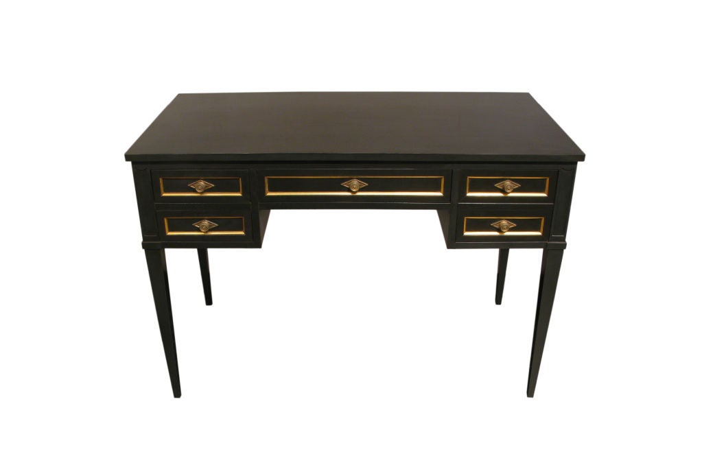 Regency style ebonized desk with pull-out sides covered in hand-tooled leather by The Beacon Hill Collection, American 1940's