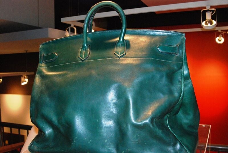 This amazing bag is 56cm the largest size made. It is a rich green color.