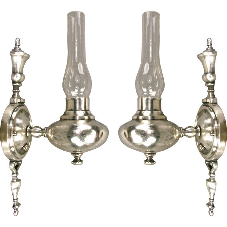 Circa 1910  pair silvered hurricane sconces