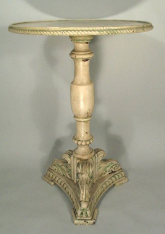 #8-106. A hand-carved Italian wood table having a crackle painted finish.