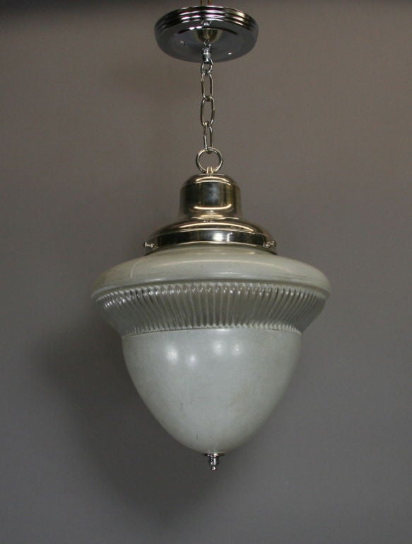 #1-2336, a satin and clear glass acorn pendant with nickel hardware.
Fixture height 15