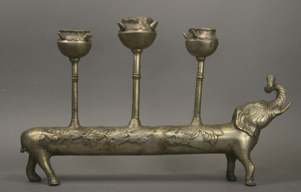#804  Silver plated brass  elephant candleholder.