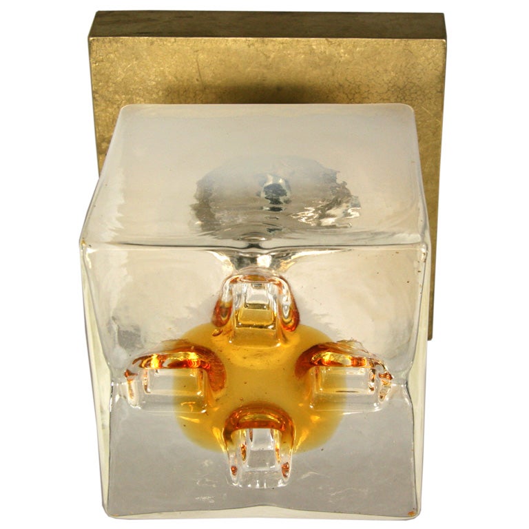 A square Mazzega glass cube over a brass base. Can be used as wall lights.