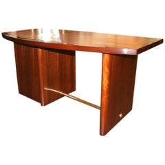 curved mahogany desk