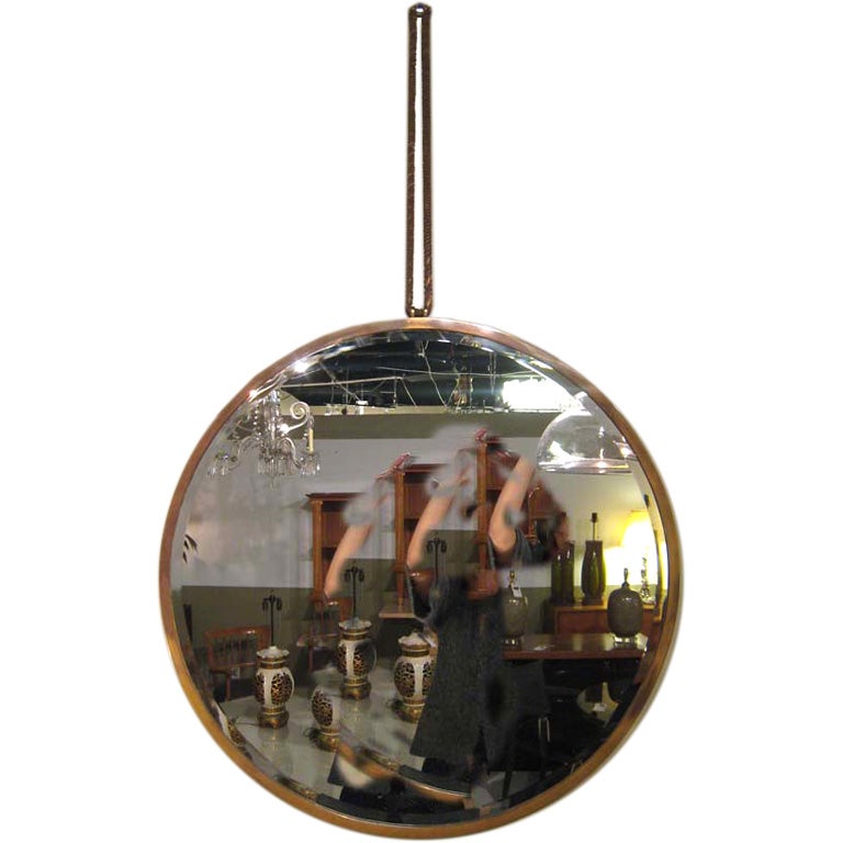 Modernist Art Deco brass mirror. Located in NY.