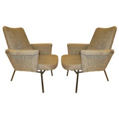 pair of sk660 armchairs designed by pierre guariche