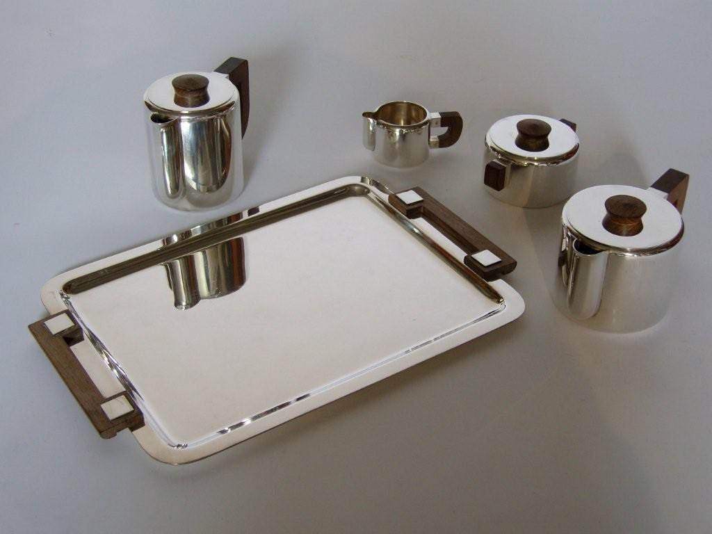 Silver Plated French Art Deco Coffee/tea Service by Luc Lanel and its Matching Tray.
Rosewood Handles.