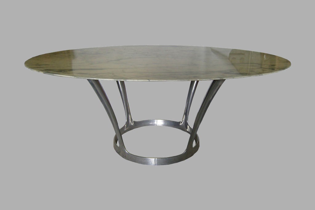 French 1970s aluminum cast base table and oval marble top by Charron.
  