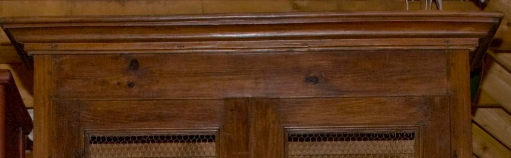 Fruitwood ARMOIRE WITH CHICKEN WIRE