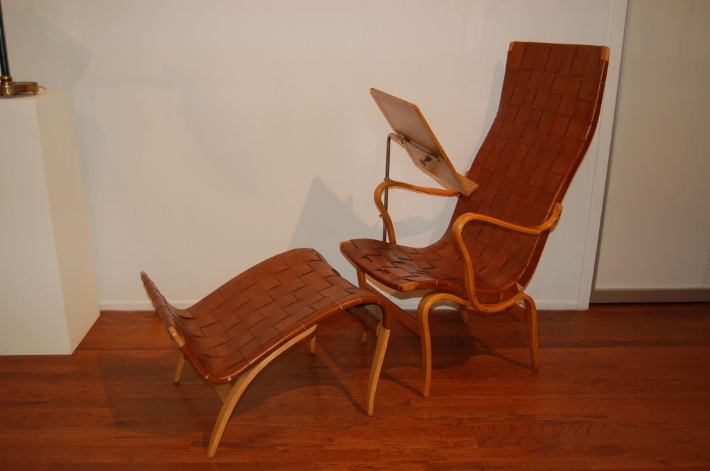 Rare Eva Lounge Chair and Ottoman by Bruno Mathsson for Firma Karl Mathsson, Varnamo, with adjustable attached reading stand<br />
Branded marks