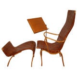 Lounge chair and ottoman with reading stand by Bruno Mathsson