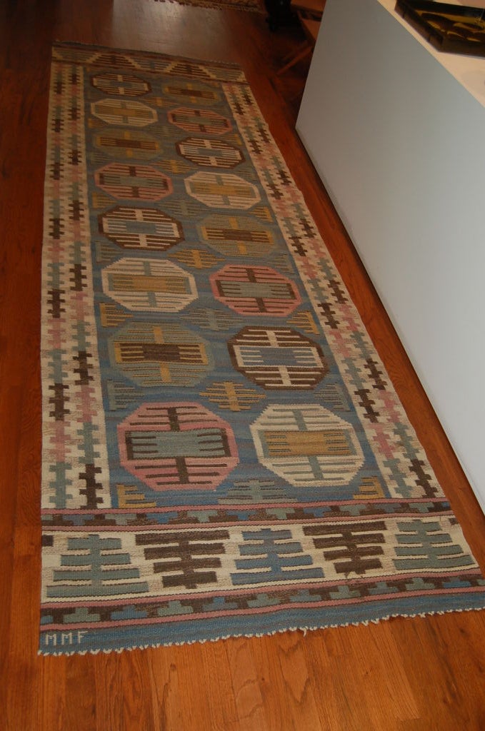 "Dukater", flat-weave runner by Marta Maas Fjetterstrom. A beautiful early example in muted tones on blue background with medallion pattern. Handwoven, signed, MMF.