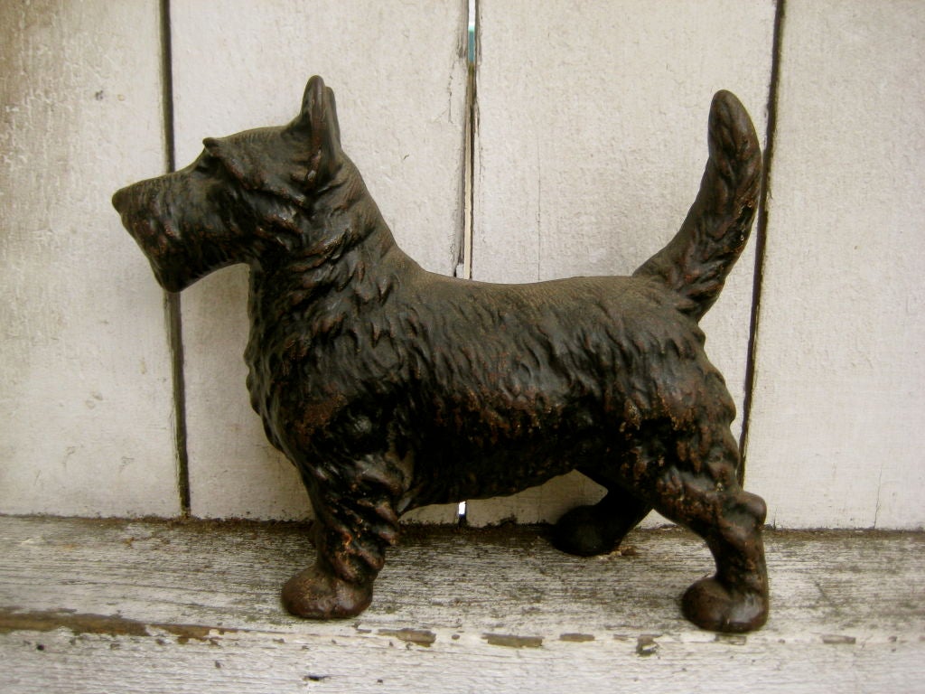 Stately cast iron Scottie door stop/