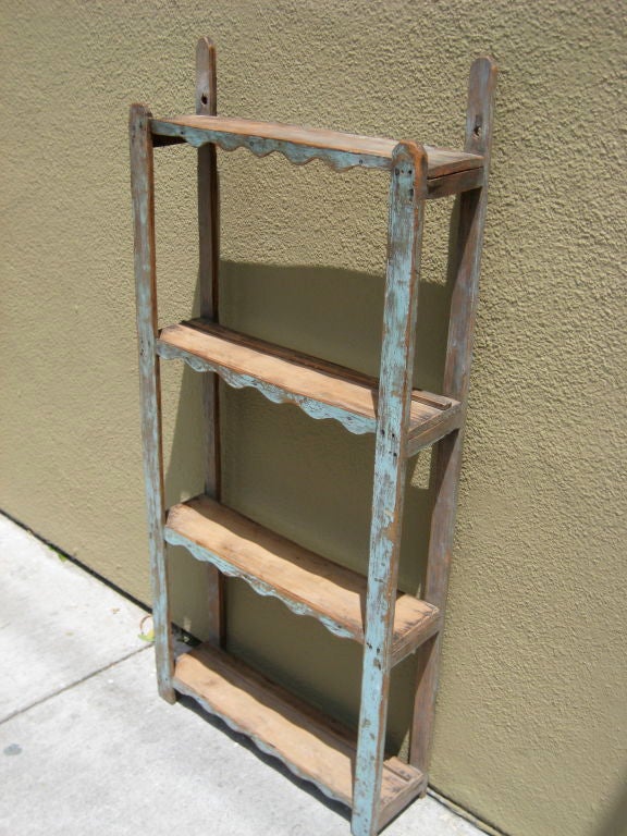 Simple and beautifully painted blue trastero.