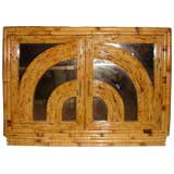 Reed and Mirror Cabinet