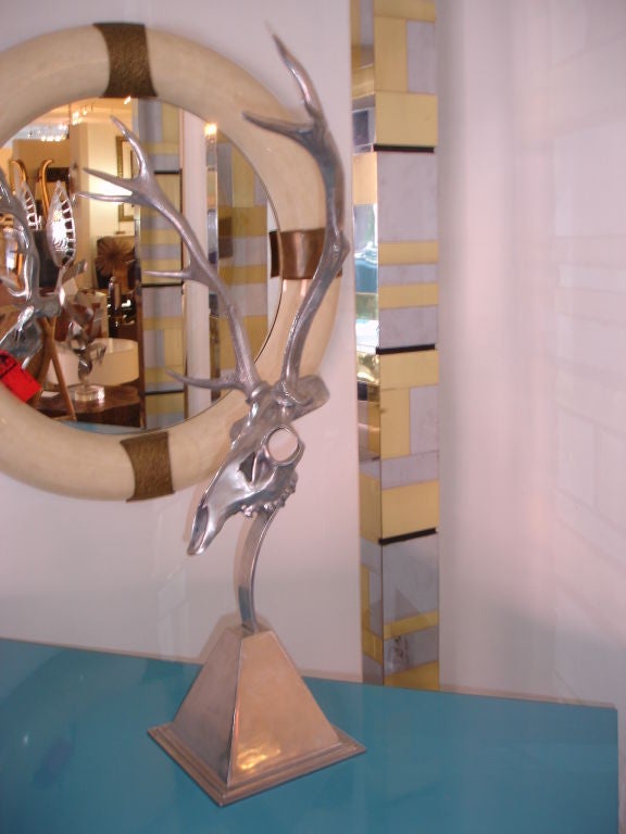 A great sculpture by Arthur Court.This skull made of aluminum and depiciting a deer skull with a full rack is not often seen.
