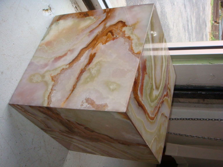 A pair of midcentury cubes of onyx. Beautiful coloration and gradation of color. Nice scale. Clean and simple design