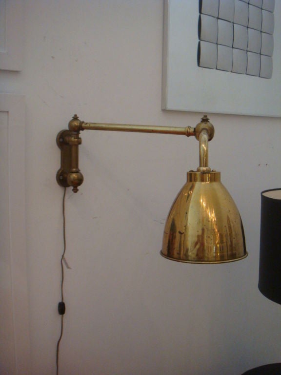 Pair of Brass Swing rm Sconces