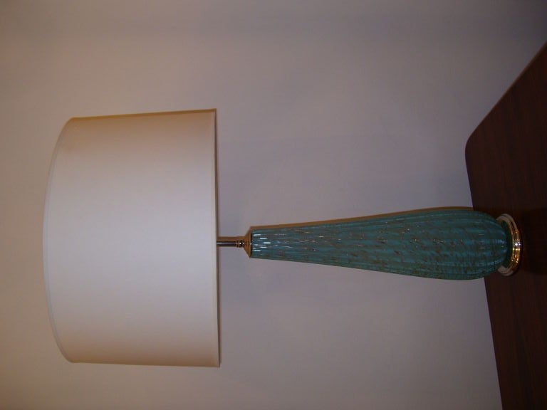 A beautiful pair of 1950's Murano copper infused sky blue table lamps with polished nickel fittings.