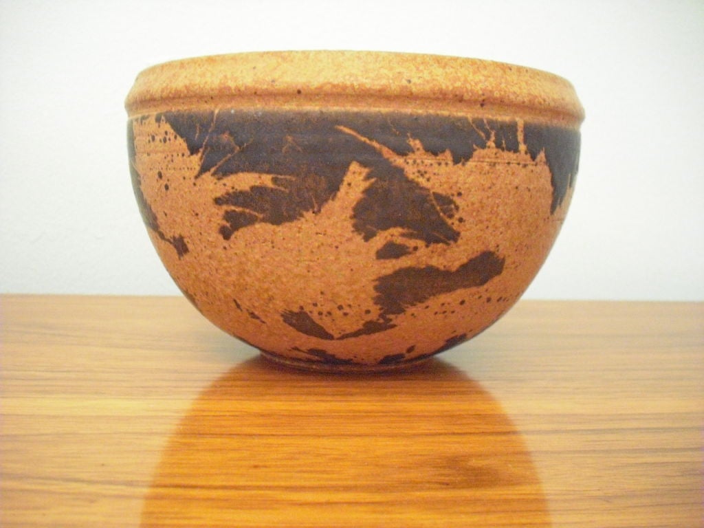 A great hand thrown stoneware art pottery vase by Victoria Littlejohn.A West Coast potter, she studied at USC with Susan Peterson and F. Carlton Ball, where she earned her teaching credential, Bachelors, and Masters degrees. She also studied