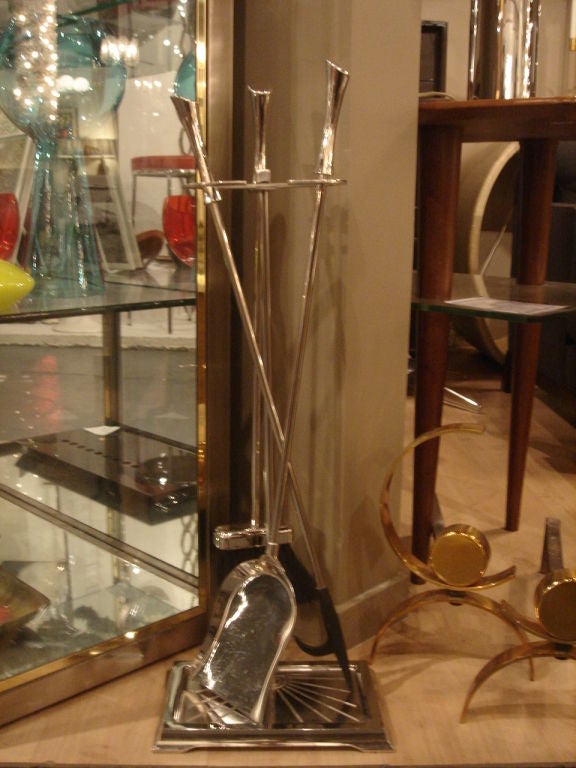 Vintage set of fireplace tools in brushed nickel finish.  Includes stand, poker, shovel and brush.  Features stylised, matching handles.<br />
<br />
Item may be viewed at our showroom at Center 44, 222 East 44th Street, New York, NY 10017, Tel:
