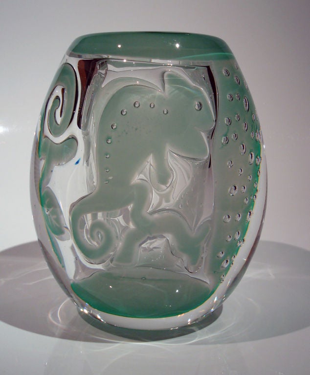 Superb Ariel Technique Vase in Clear and Celedon Glass. Design motifs include Two Celedon Chameleons on Clear Glass, One Stretched Along a Branch and the Other Sitting Upright Upon a Branch,Each with a Curling Tail. Other Elements Include Celedon