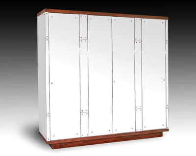 A MASSIVE ITALIAN 1950'S FOUR-DOOR MIRRORED ARMOIRE