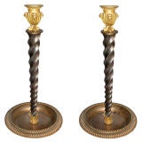 PAIR OF FRENCH EMPIRE GILT-BRONZE & STEEL CANDLESTICKS