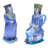 TWO  FRENCH POLYCHROMED FAIENCE POTTERY FIGURAL TANKARDS
