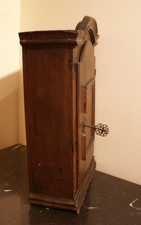 A very handsome and rare pine spice cabinet probably made in Sweden during the 18th century.