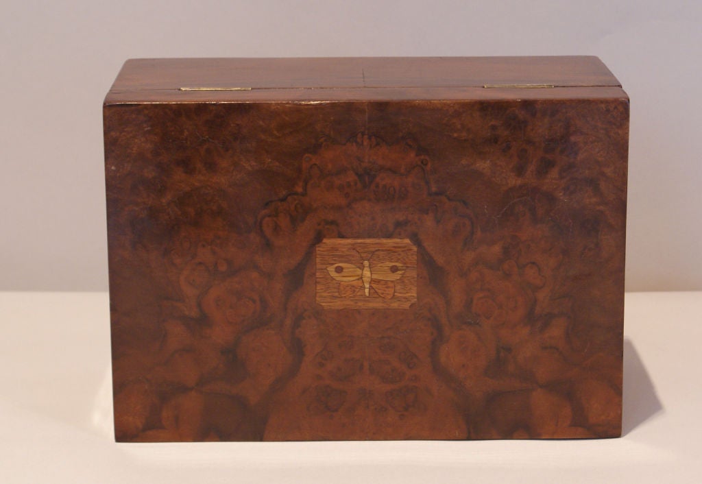 Burled walnut inlaid jewelry box with a butterfly on the top