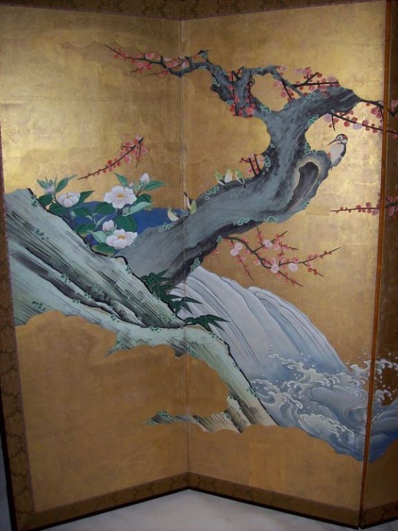 An early 19th century six panel screen from Japan with a gold leaf background. Beautifully painted design of flowers, birds, and a stream by a Kano school artist. Purchased from the Kyoto Screen Company in Kyoto, Japan. Each panel measures