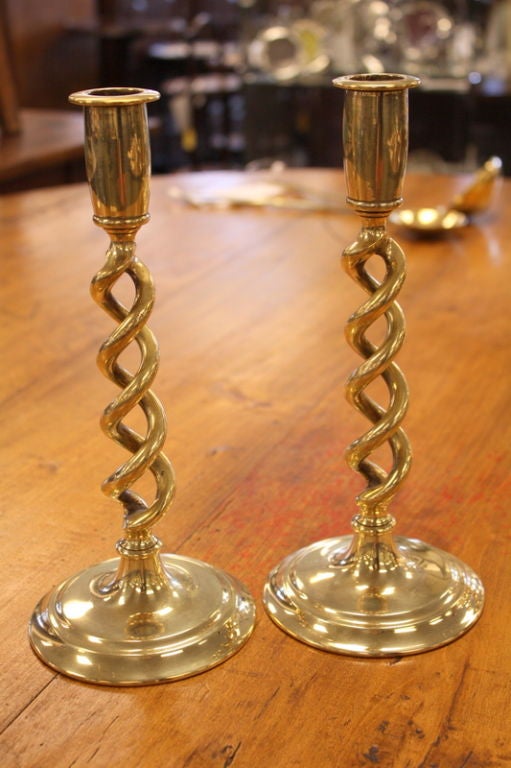 A selection of fine brass candlesticks from England, very decorative, for the table. Price per pair ranges from $290 per pair and up.
Image #3-(ref # 0907-120A) Open barley twist candlesticks, c. 1900, 10 1/2