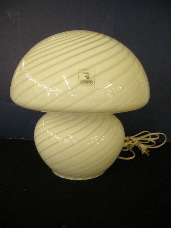 Hand blown glass mushroom design lamps made in Murano for Vetri with original sticker affixed on both lamps; opaque swirl pattern throughout.