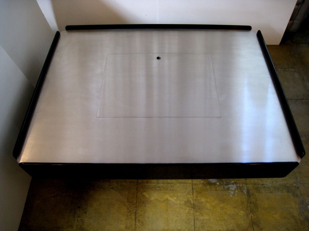 Brushed Aluminum and Lacquered Wood Coffee Table with Built in Storage and Drawers on Either End.