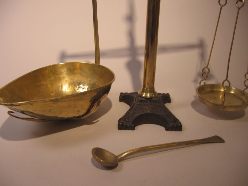 Large brass and iron balance scale by Avery, Biringham, England.  Top and base of scale are wrought iron.  <br />
 Stamped  