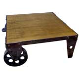 "INDUSTRIAL CHIC" IRON AND LEATHER COFFEE TABLE