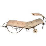 WROUGHT IRON AND LINEN CHAISE LONGUES