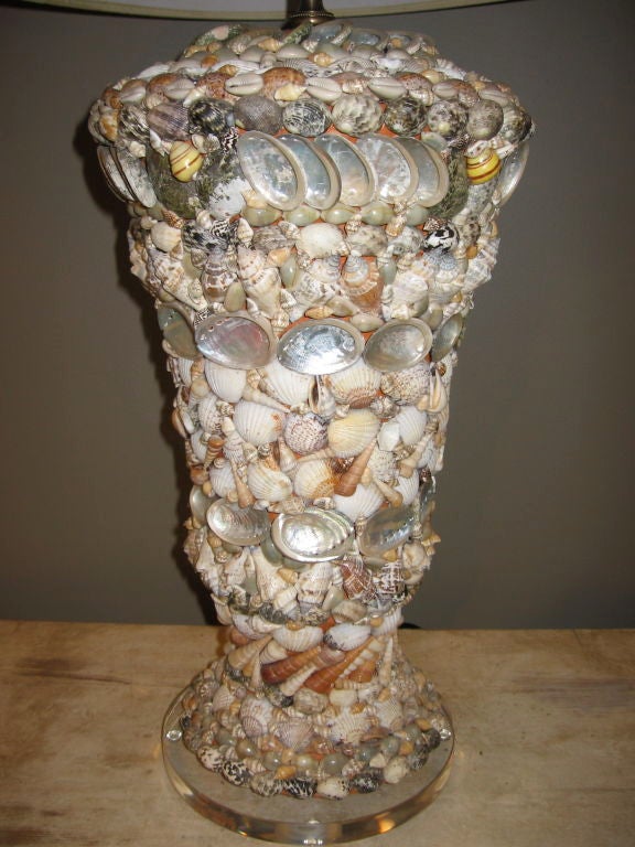 Shell encrusted lamp on lucite base, with kraft paper shade.  Height to top of socket is 23